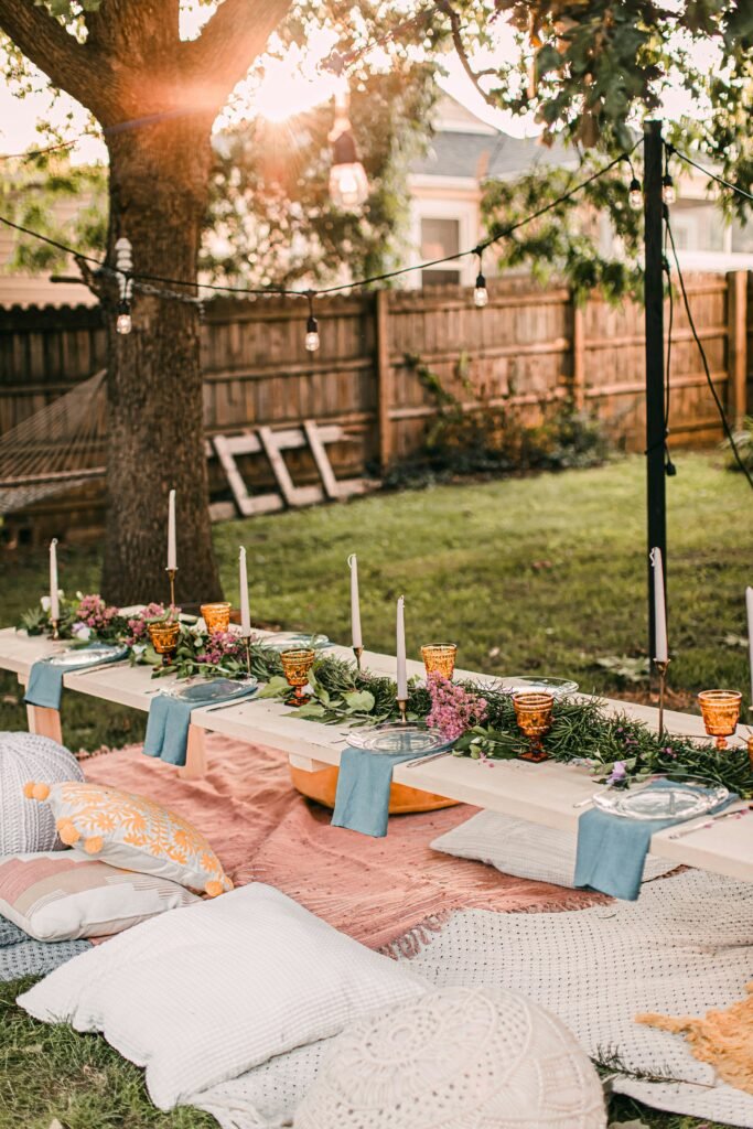 Luxury picnic setup in East Tennessee by Sunset Spreads with pastel décor and styled tableware